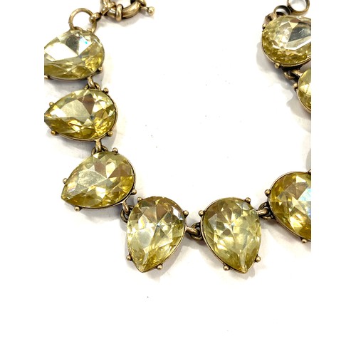 513 - Yellow metal bracelet set with yellow stones