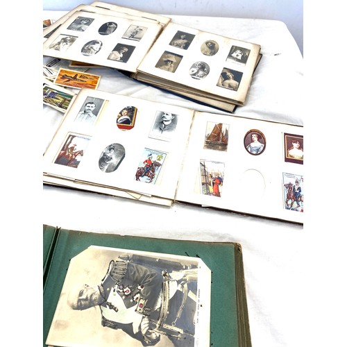 496 - Selection of antique and later postcards and cigarette cards