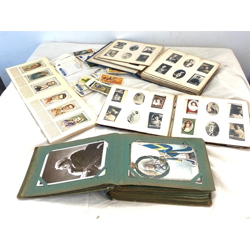 496 - Selection of antique and later postcards and cigarette cards