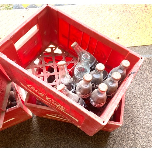 459 - 4 Vintage Cocoa Cola plastic crates with 56 full cola glass bottles, 25 empty bottles - not comsumab... 