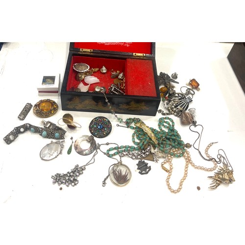 599 - Large selection of vintage and later costume jewellery includes silver pendant and badge