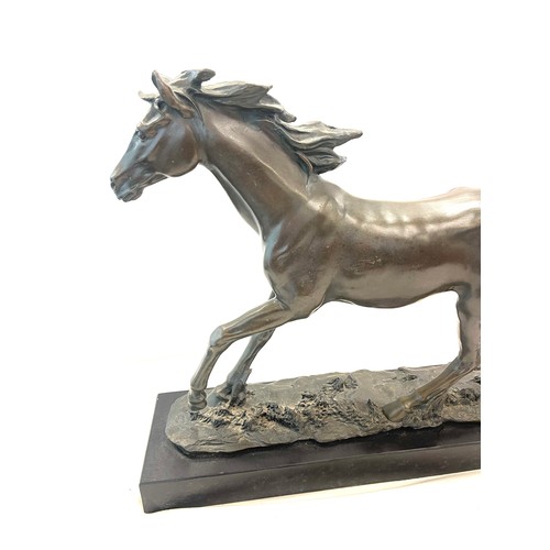 370 - Large Bronze sculpture of a elegant running Horse, mounted on a black polished solid Marble base, si... 