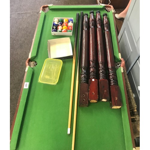 487 - Small  child's pool table, detachable legs, approximate measurements Length 47 inches, Width 25 inch... 