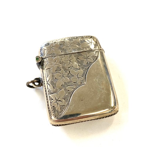 509 - Silver vesta case half engraved with flowers front and back weight approx