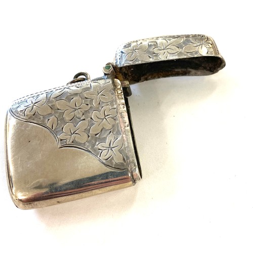 509 - Silver vesta case half engraved with flowers front and back weight approx