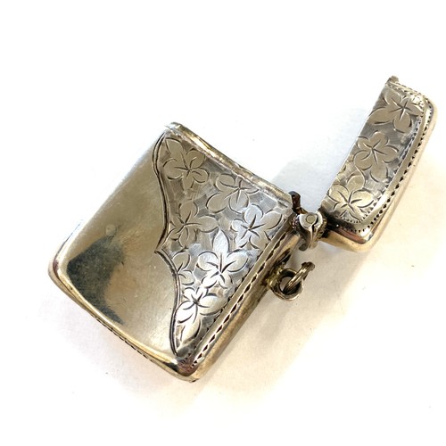 509 - Silver vesta case half engraved with flowers front and back weight approx