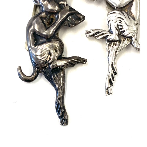 482 - Sterling silver pixie brooch, one white metal pixie brooch