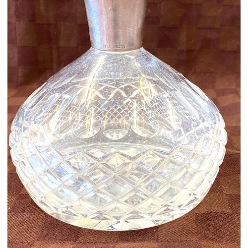 41 - Silver hallmarked rimmed cut glass ship decanter with stopper