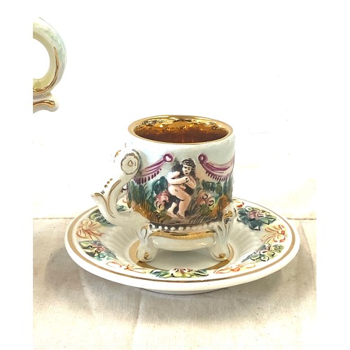 520 - 3 pieces of Capodimonte to include lidded small, small cup and saucer, all in good overall condition