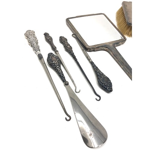 36 - Selection of silver items includes mirror & brush button hooks etc