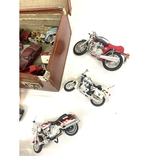 203 - Small leather case with model motorbikes, cars etc, to include Corgi