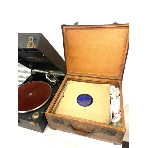 348 - Vintage record player together with a selection of records within a storage case