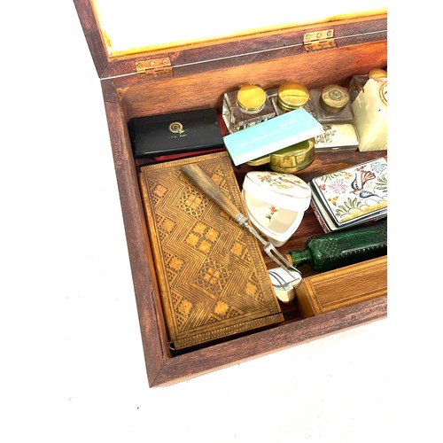 213 - Showcase together with contents to include table lighter, ashtray, ink wells etc, case measures appr... 