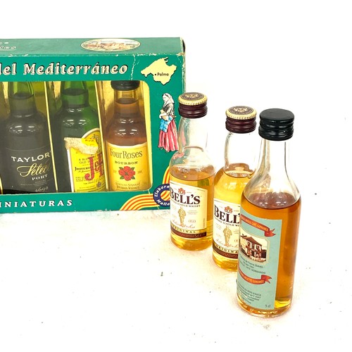 137 - Selection of alcohol miniatures includes bells whisky etc