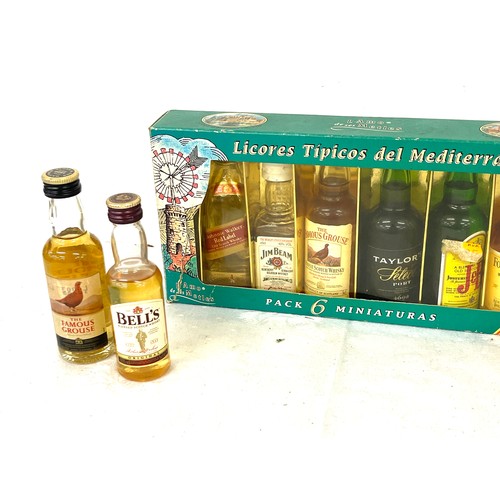 137 - Selection of alcohol miniatures includes bells whisky etc