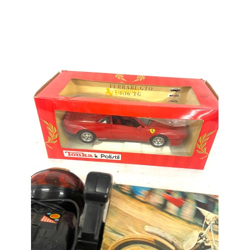 108 - Selection of vintage toys to include a Talkatron, Yamaha 250 mx bike and a Tonka Ferrari