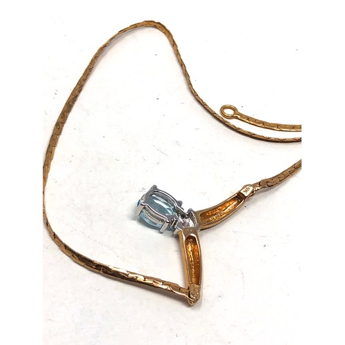 275 - 9ct gold topaz & diamond pendant necklace (5.4g)