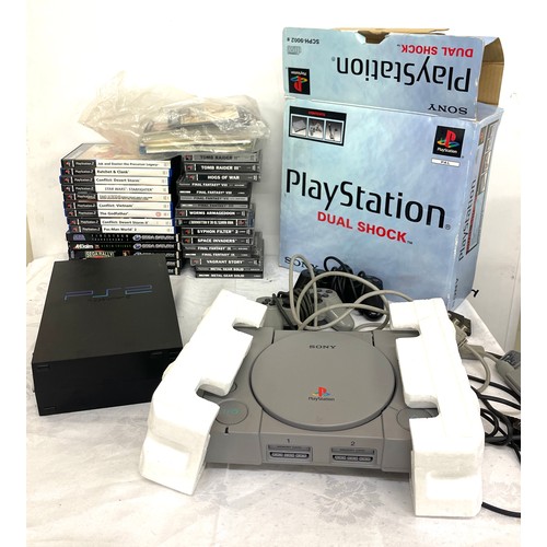 270 - Playstation 1 and 2 Dual shock consoles with games, both untested