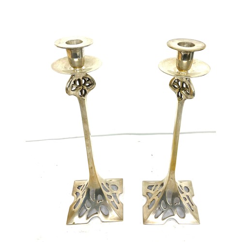 135 - Pair Art Nouveau Silver plated candle sticks, approximate height 14.5 inches