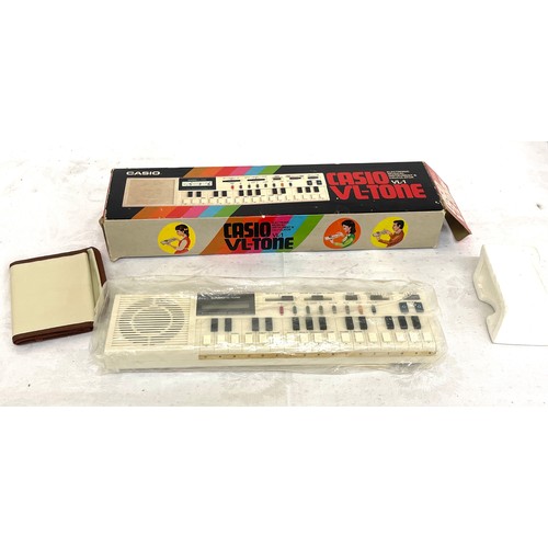 132 - Vintage Casio VL-1 VL-TONE electronic musical instrument and calculator with original box and packag... 