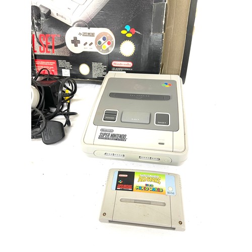 198 - Boxed Super Nintendo console, 2 control pads, charger, leads and game, untested