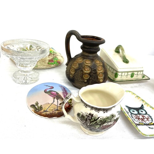 269 - Selection of collectable pieces to include pottery jugs, Sadler ginger jar, Poole charger glassware ... 