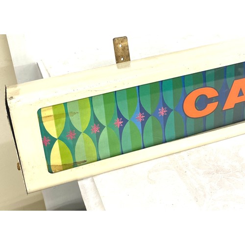 67 - Metal and perspex light up Cadburys advertising sign, in need of re-wiring, approximate length 36 in... 