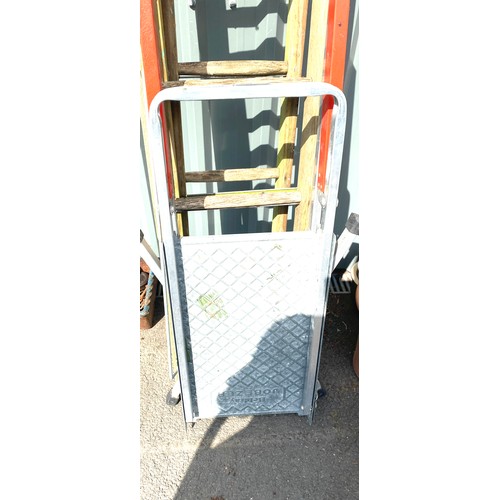 100C - Selection of wood and metal ladders.