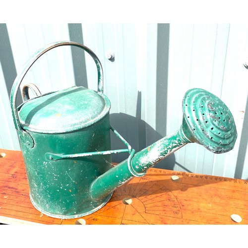 166 - Vintage watering can with rose.