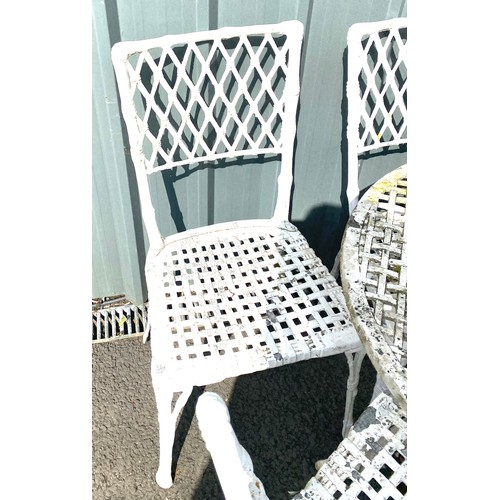 100G - Vintage metal table and four chairs with parasol.