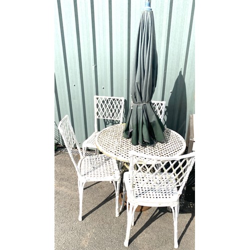 100G - Vintage metal table and four chairs with parasol.