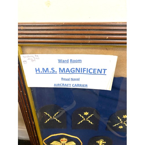 24 - Royal Navy badges framed, frame measures 31 inches wide by 25 inches tall