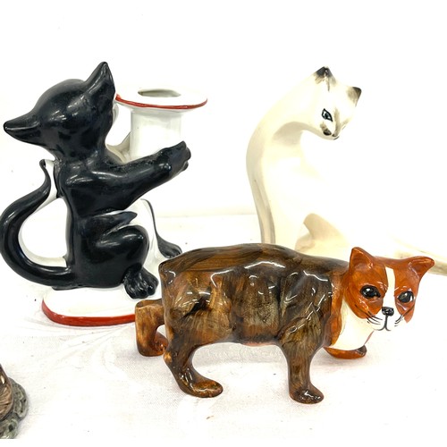 243 - Selection of cat ornamental pieces to include a Carltonware teapot, candlestick etc, all in good ove... 