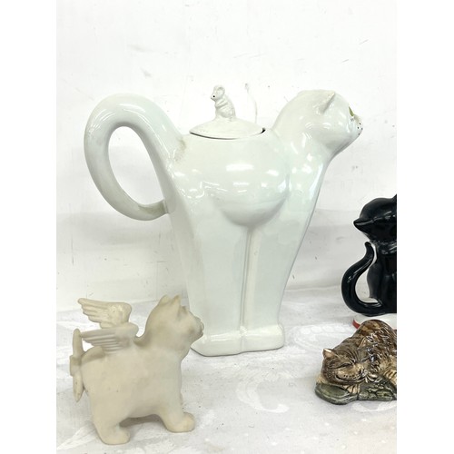 243 - Selection of cat ornamental pieces to include a Carltonware teapot, candlestick etc, all in good ove... 