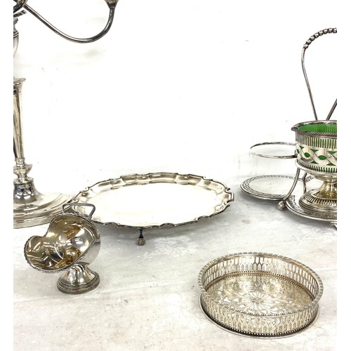 206 - Box of silver plated items to include decanter stand, candlestick