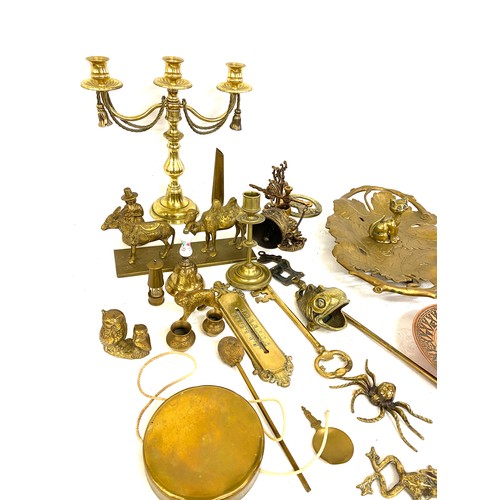 273 - Large selection of brassware to include candelabra, gong etc