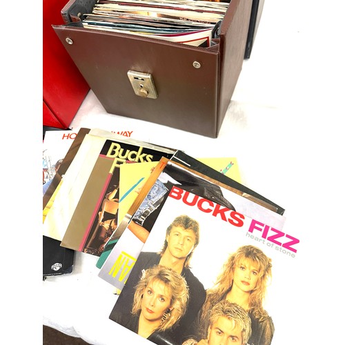 335 - Large selection of 45's to include 4 cases to include Bucks Fizz, Adam and the Ants, etc