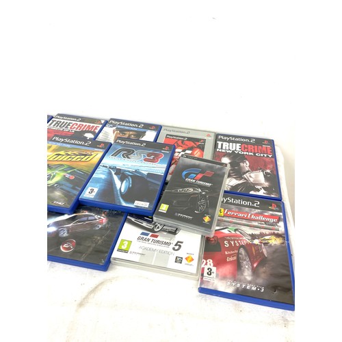 179 - PS2 console with selection of 13 games, 2 controllers, untested