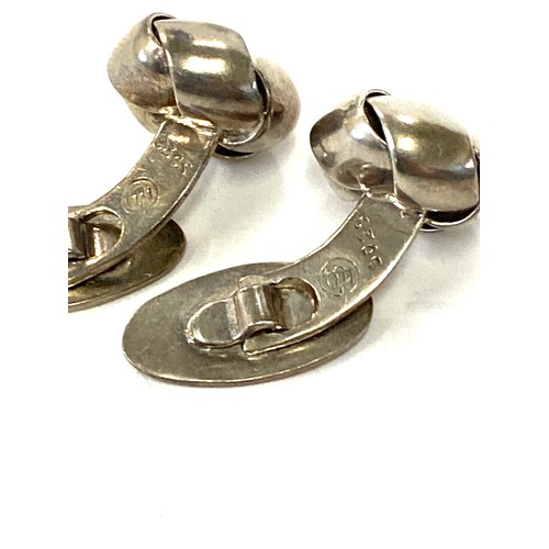 580 - Selection of named vintage silver jewellery includes N.E cufflinks, Denmark and 2 other Danish tie c... 