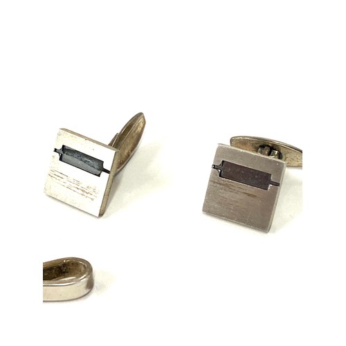 580 - Selection of named vintage silver jewellery includes N.E cufflinks, Denmark and 2 other Danish tie c... 