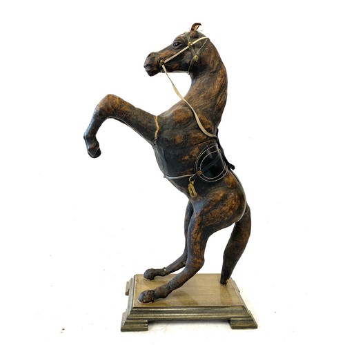 90 - Vintage leather prancing horse on stand, approximate overall height: 17 inches