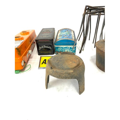 207 - Selection of miscellaneous to include advertising tins, the CMF safety link distress radio telephone... 