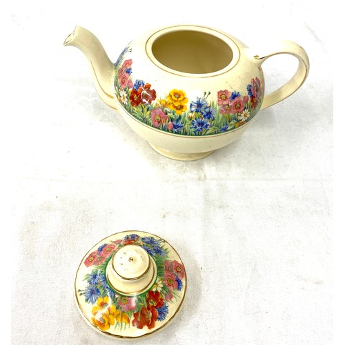 458 - Clarice Cliff. A J Wilkinson Honey glaze Radiance teapot, good overall condition