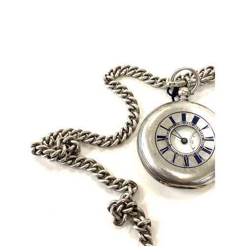 610 - Hallmarked silver half hunter pocket watch and silver fob chain