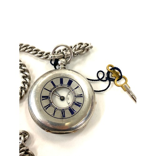 610 - Hallmarked silver half hunter pocket watch and silver fob chain