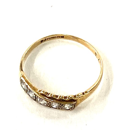 611 - 9ct gold ring set with 5 stones, ring size M, approximate weight: 1g