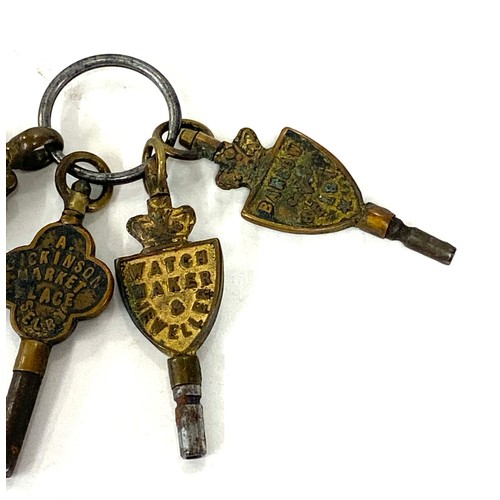 504 - Antique 19th century advertising watch keys with intaglio seal