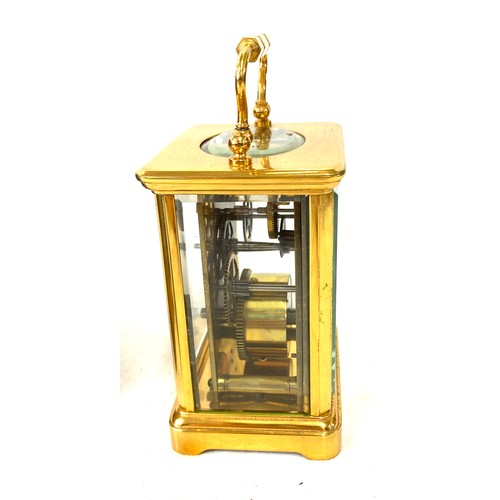 134 - French carriage clock with original case, winds up and ticks, no warranty given