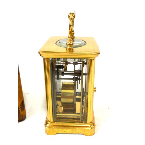 134 - French carriage clock with original case, winds up and ticks, no warranty given