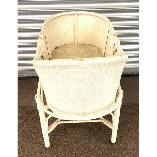 412 - Vintage child wicker crib on wheels, measures 32.5